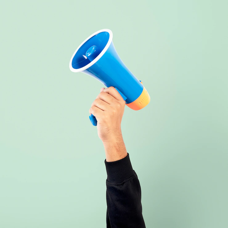hand-holding-megaphone-marketing-announcement-campaign_53876-129003