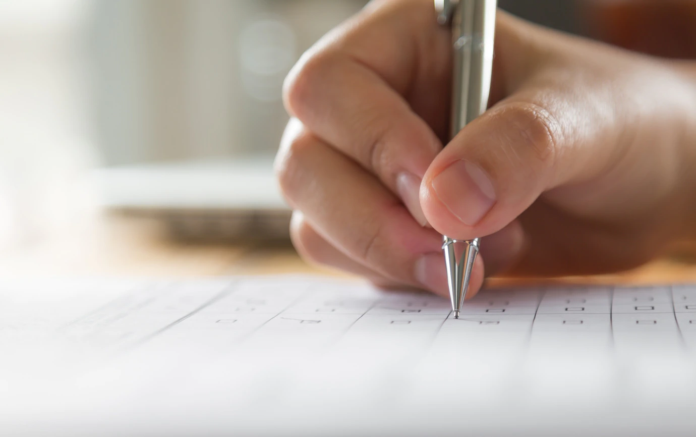 hand-writing-paper-with-pen_1232-1344